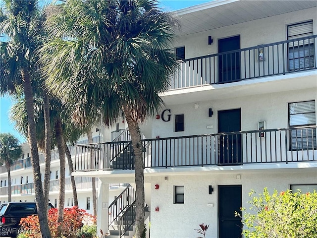 view of property with stairway