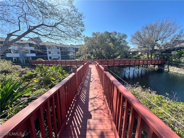 view of community with a water view