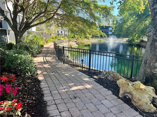 view of patio featuring a water view