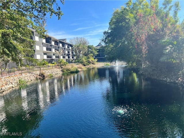 property view of water with fence