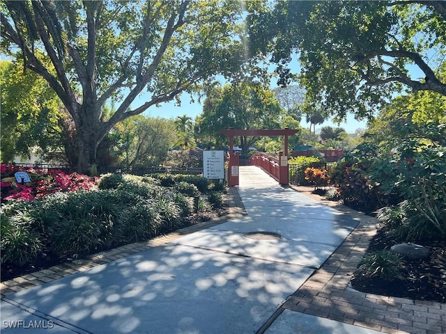 view of gate with fence