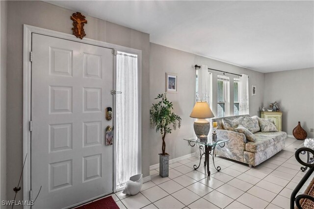 foyer with light tile patterned floors