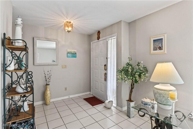 entryway featuring light tile patterned flooring