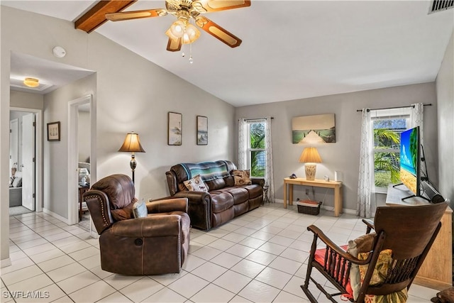 tiled living room with vaulted ceiling with beams and ceiling fan