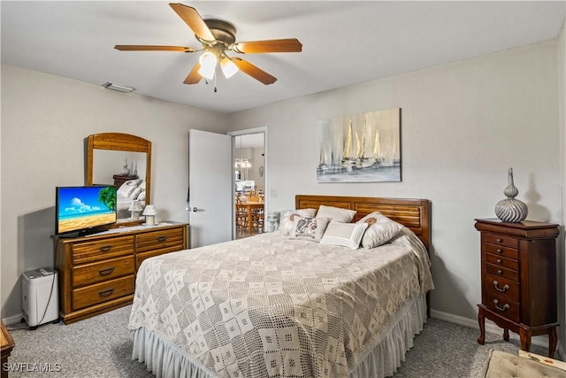 bedroom featuring carpet, visible vents, ceiling fan, and baseboards