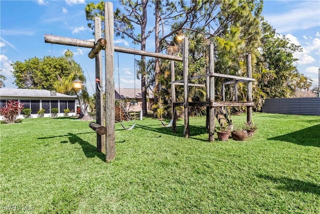 view of yard with a sunroom