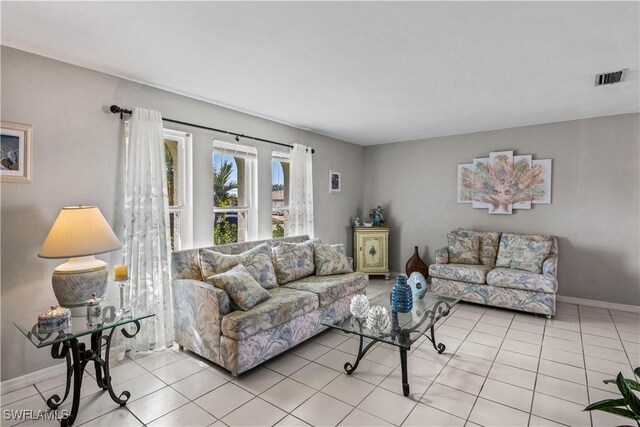 living room with light tile patterned flooring