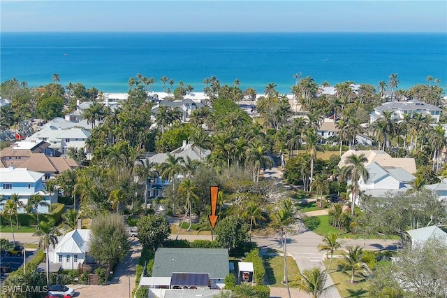 bird's eye view with a water view and a residential view