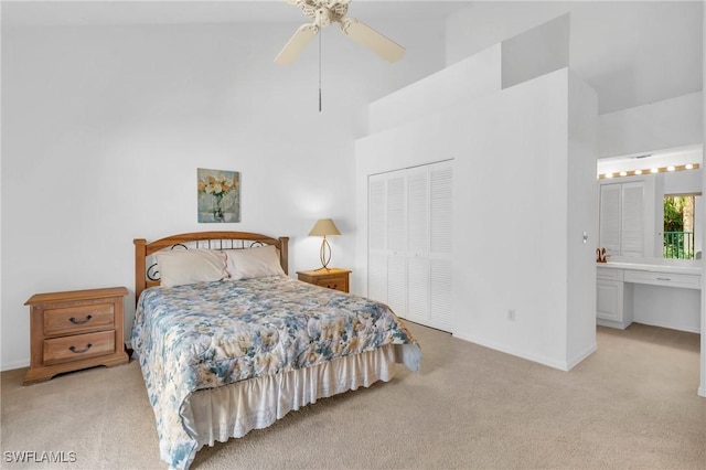 bedroom with light carpet, connected bathroom, a closet, and ceiling fan