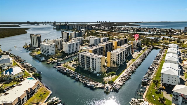 drone / aerial view with a water view