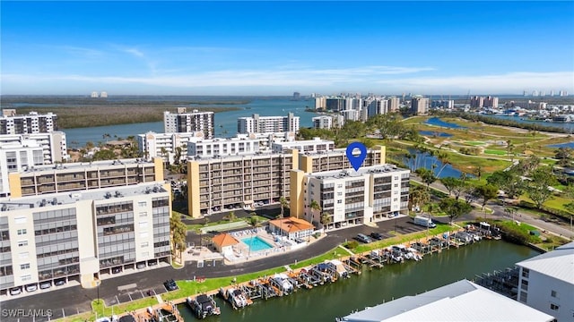 drone / aerial view with a view of city and a water view