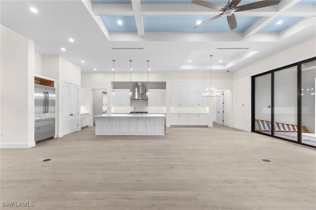 740 13th St NW, Naples, FL 34120 - unfurnished living room featuring coffered ceiling, a chandelier, a ceiling fan, recessed lighting, and light wood-type flooring