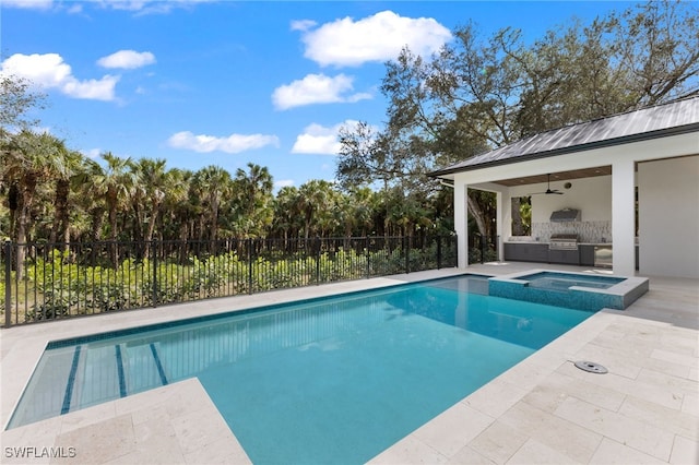 view of pool with an in ground hot tub, ceiling fan, a grill, and a patio area