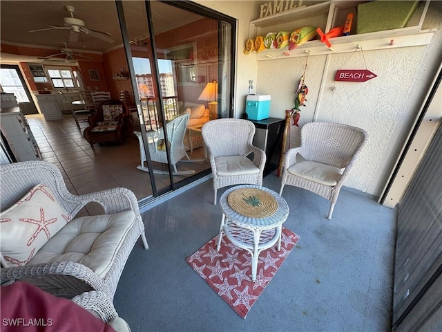 interior space featuring ceiling fan