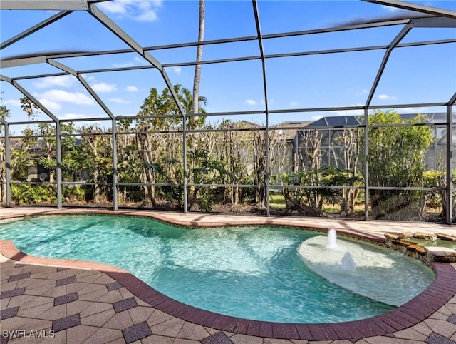 view of pool featuring a lanai