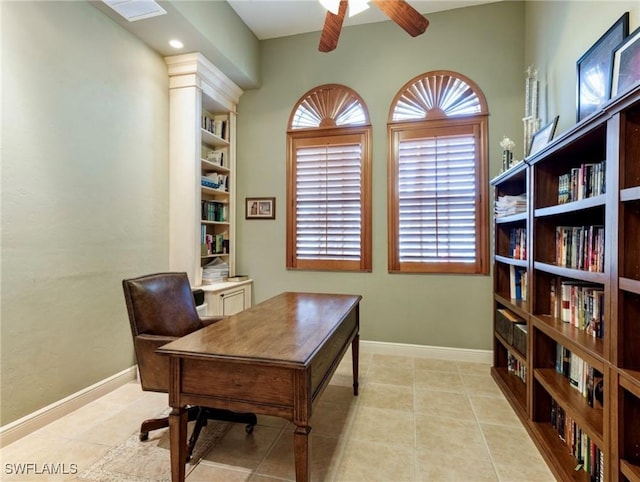 office area featuring light tile patterned flooring and ceiling fan