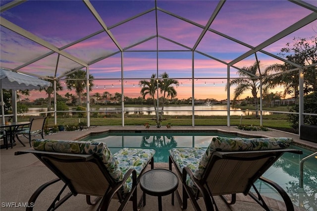 9109 Astonia Way, Estero, FL 33967 - view of patio featuring a lanai, a water view, and an outdoor pool