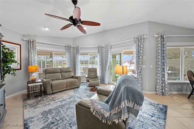 living room with ceiling fan and light tile patterned flooring