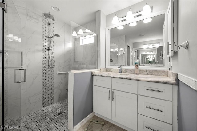 bathroom featuring vanity and walk in shower