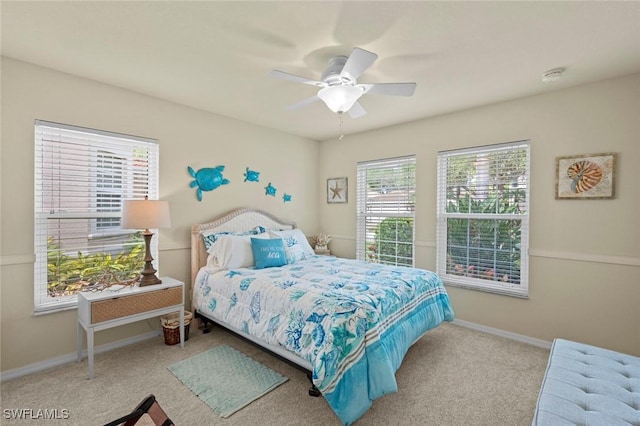 bedroom featuring ceiling fan and light colored carpet