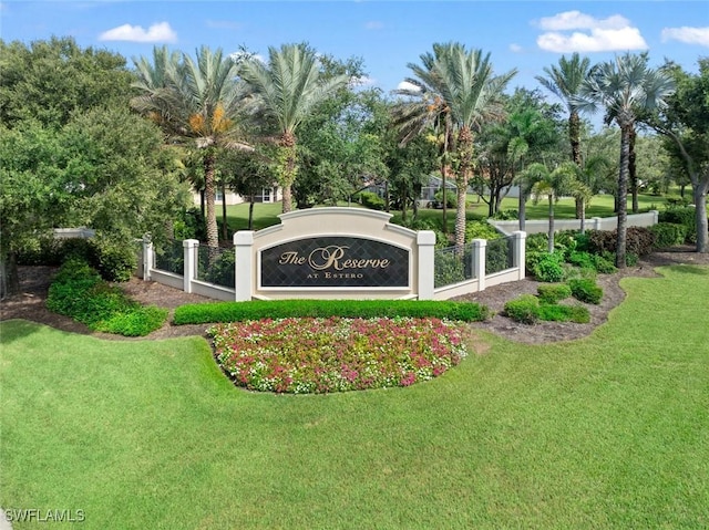 community sign with a lawn