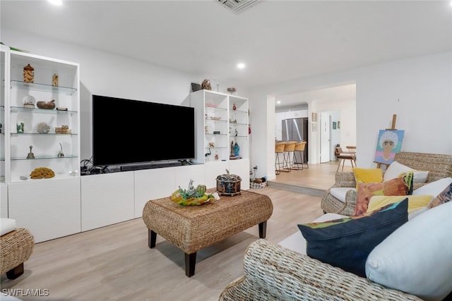 living room with light wood-type flooring