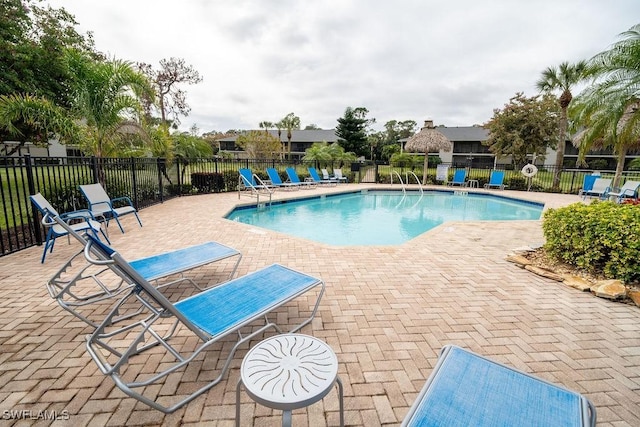 view of pool featuring a patio area