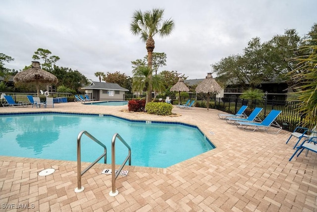 view of swimming pool featuring a patio area