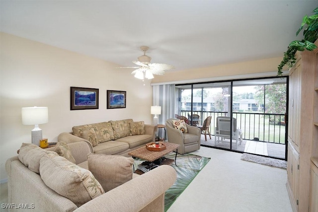 living room featuring ceiling fan and light colored carpet