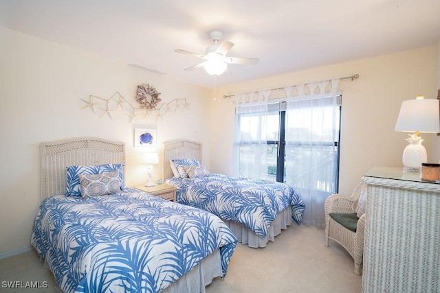 bedroom with ceiling fan and carpet