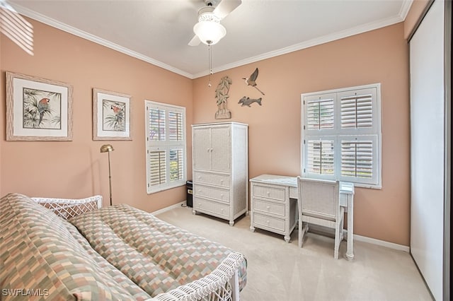 carpeted bedroom featuring multiple windows, crown molding, and ceiling fan