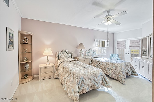 bedroom featuring ornamental molding, light colored carpet, french doors, and ceiling fan