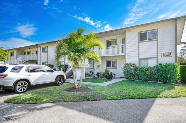 view of front of house with a front yard