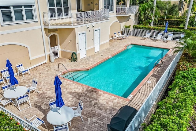 view of pool with a patio area