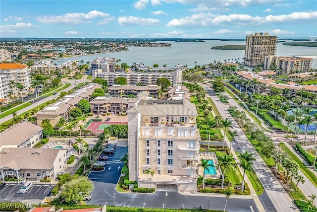 birds eye view of property featuring a water view