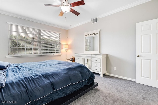 carpeted bedroom with multiple windows, crown molding, and ceiling fan