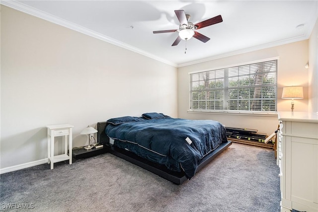 carpeted bedroom featuring crown molding and ceiling fan