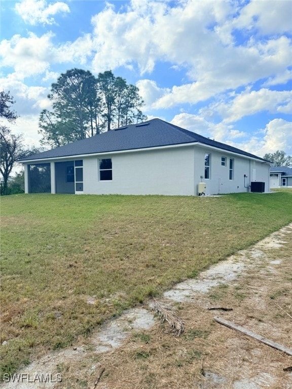 view of home's exterior featuring a yard