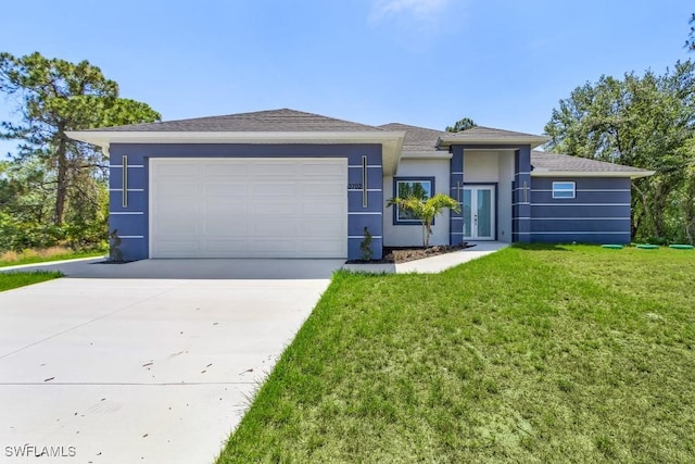 3702 Flora Ave N, Lehigh Acres, FL 33971 - view of front facade with concrete driveway, a front lawn, stucco siding, and a garage