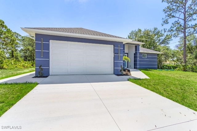3702 Flora Ave N, Lehigh Acres, FL 33971 - view of front of home with concrete driveway, stucco siding, a front lawn, and an attached garage