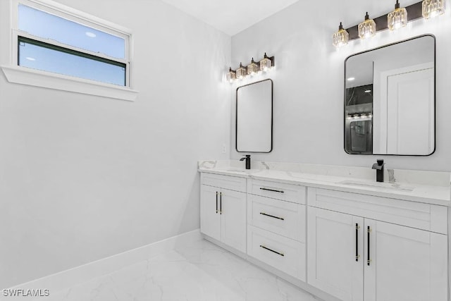 3702 Flora Ave N, Lehigh Acres, FL 33971 - full bathroom with marble finish floors, baseboards, and double vanity