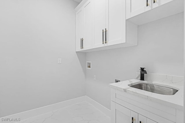 3702 Flora Ave N, Lehigh Acres, FL 33971 - washroom featuring marble finish floors, hookup for a washing machine, cabinet space, and baseboards