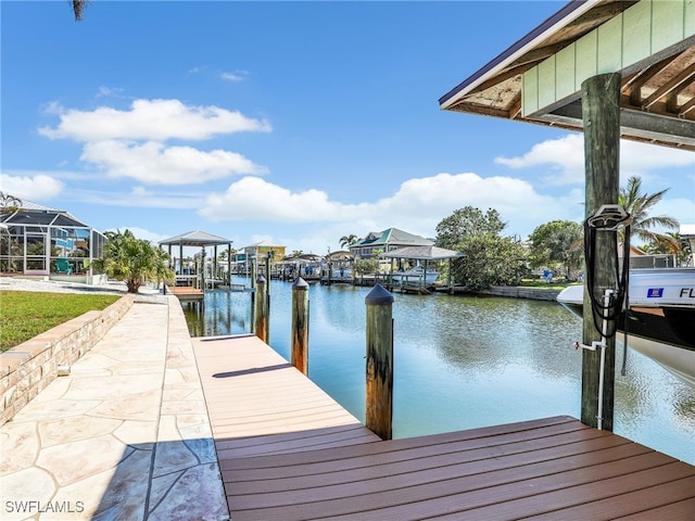 dock area featuring a water view