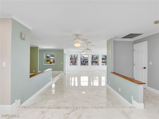 hall featuring crown molding and a wealth of natural light