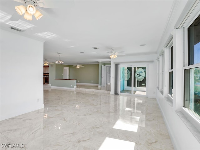 unfurnished room featuring ceiling fan