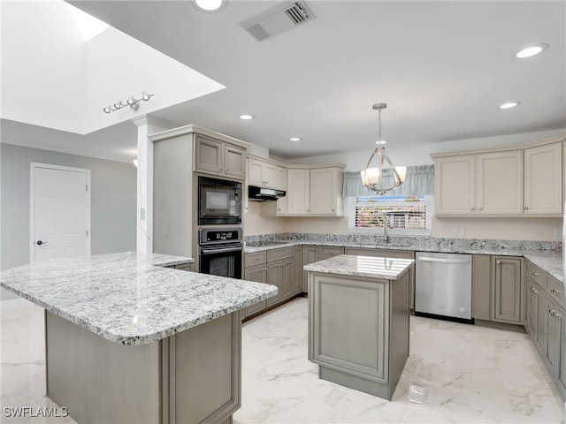 kitchen featuring pendant lighting, sink, a center island, black appliances, and light stone countertops