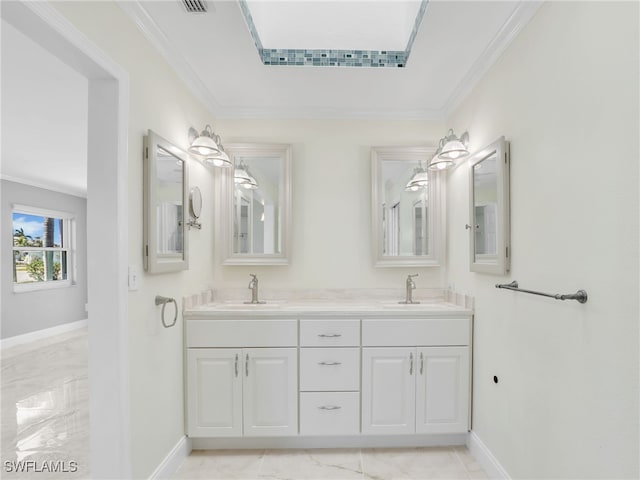 bathroom with crown molding and vanity