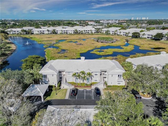 bird's eye view with a water view