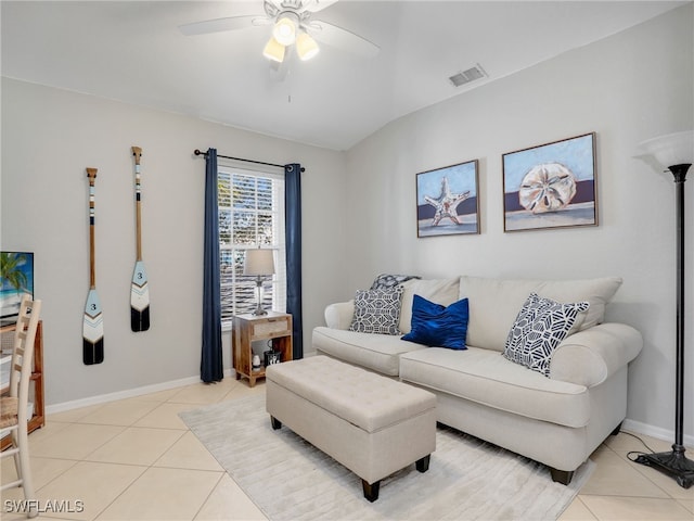 living room with light tile patterned flooring and ceiling fan