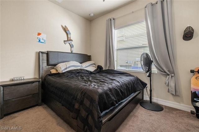 bedroom with light carpet